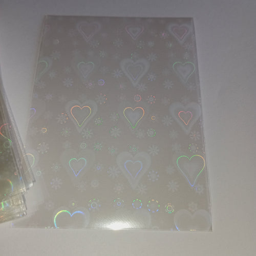 50 vnt. holografinės kortelių įmautės (sleeves) 65×90 mm – Pokémon, MTG, TCG kortelėms Hearts