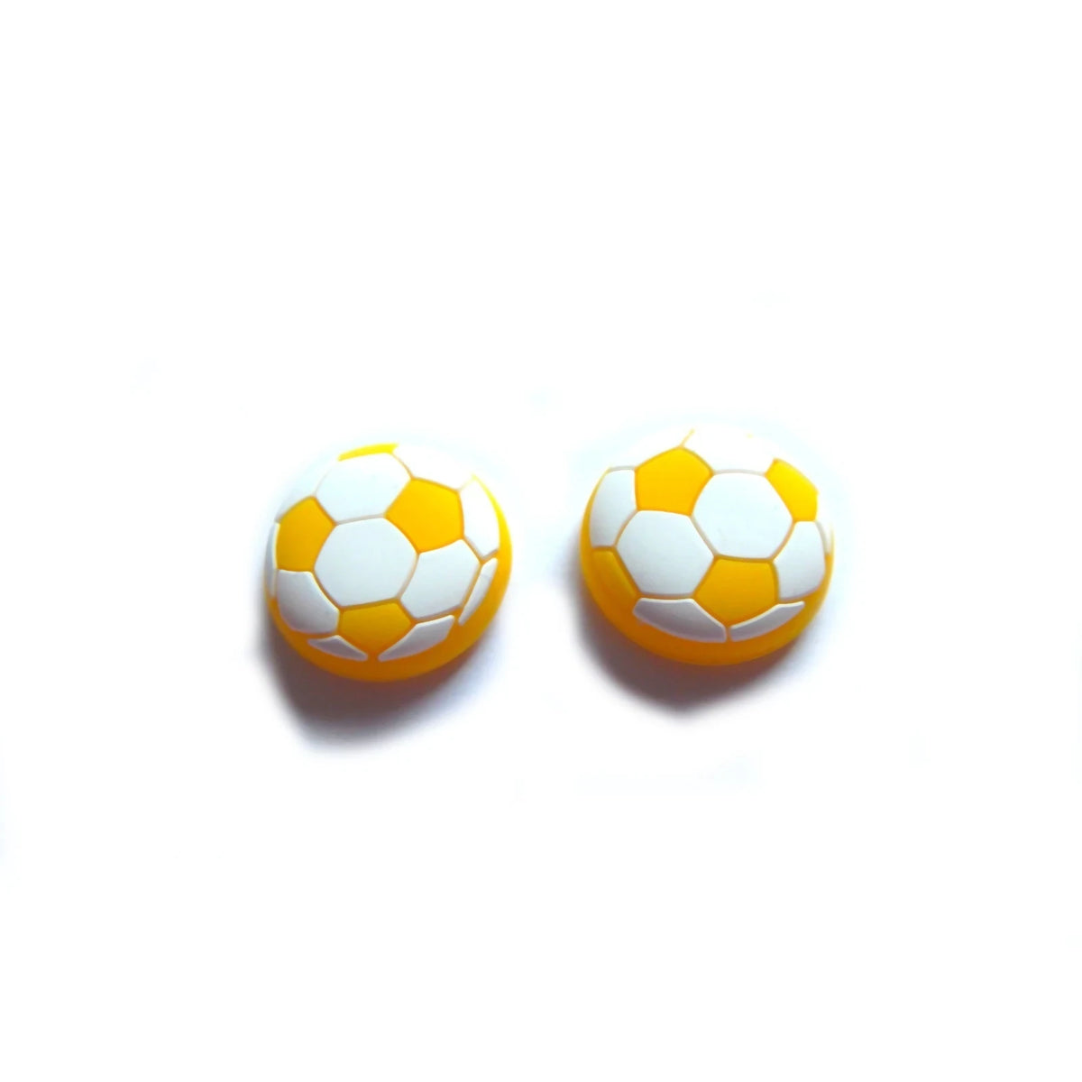 Analogu nykščių svirtelių dangteliai (thumbstick) su futbolo kamuolio dizainu geltoni