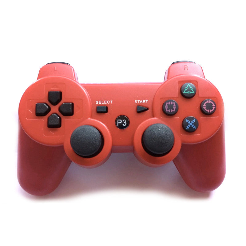 Red gaming controller on a white background ps3 playstation 3