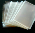 Kortelių dėkliukai įmaitės (card sleeves) – 6×9 cm, skaidrūs, 100/50/20 vnt.