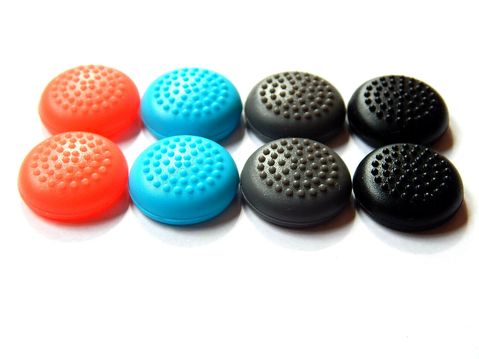 Nintendo Switch analogų gumelės (thumbstick grips) – neslystančios, 2 vnt.