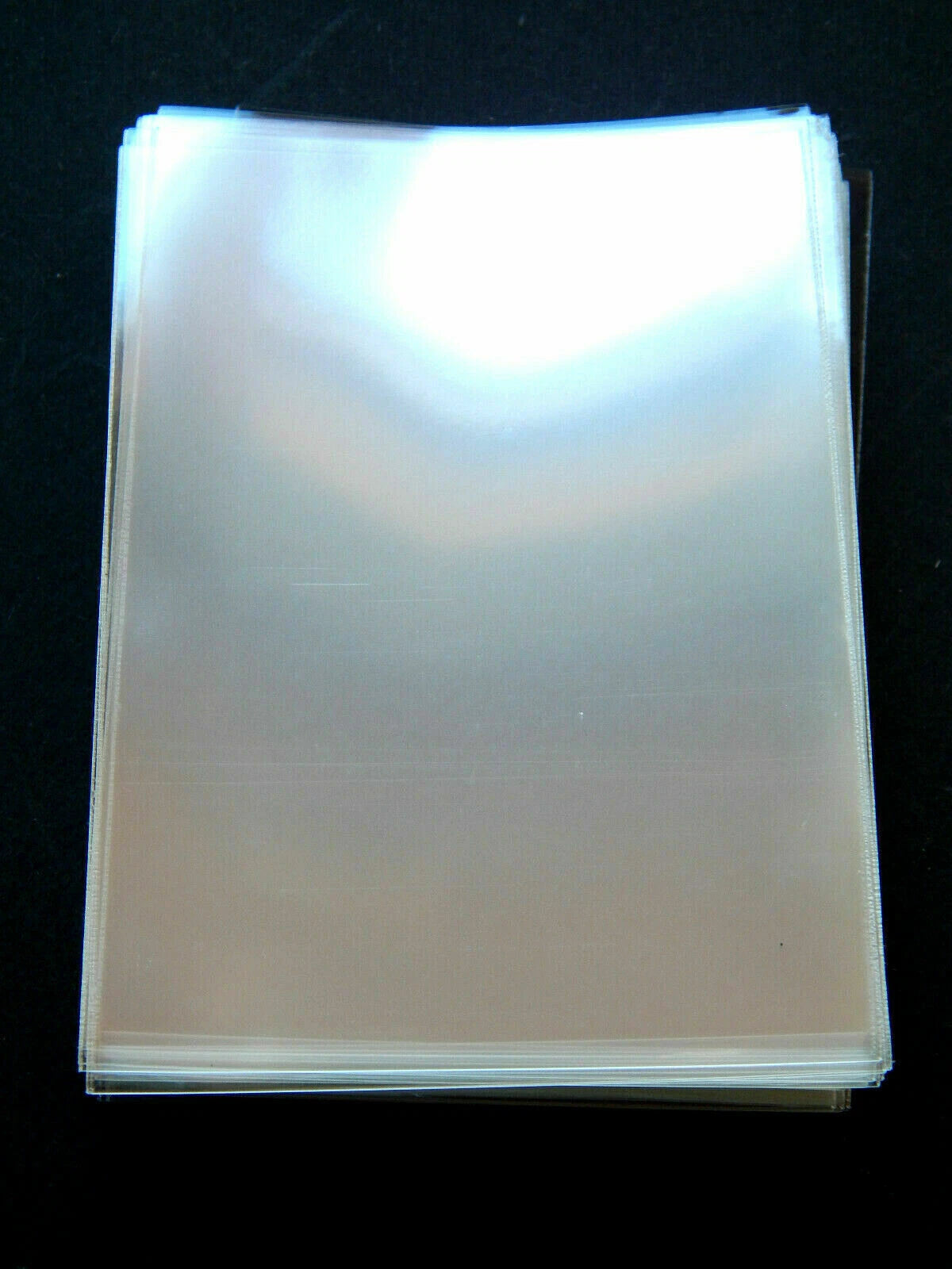 Kortelių dėkliukai įmaitės (card sleeves) – 6×9 cm, skaidrūs, 100/50/20 vnt.